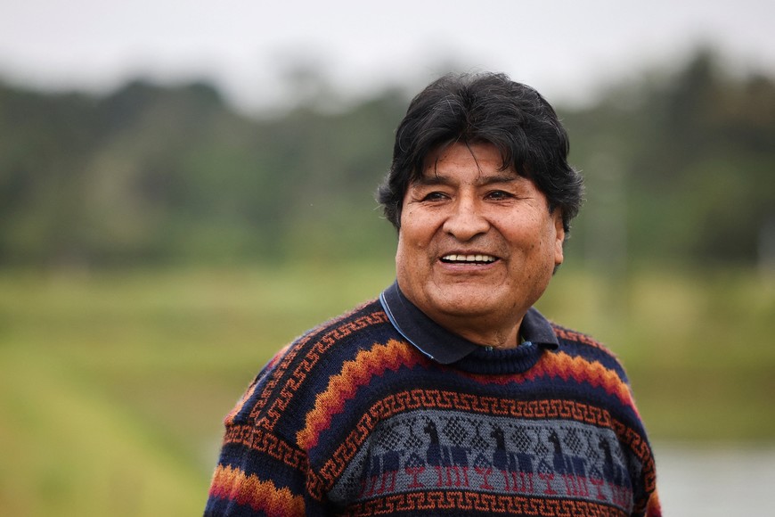 Former Bolivian President Evo Morales smiles after feeding his fishes at his farm, ahead of the August 17 general election, in Villa 14 de Septiembre, Cochabamba, Bolivia August 13, 2025. REUTERS/Agustin Marcarian