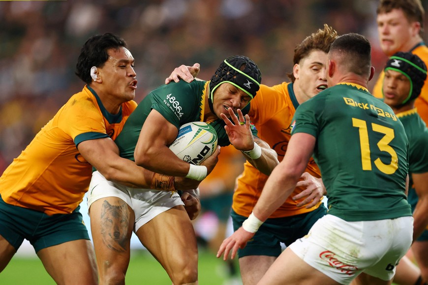 Rugby Union - Rugby Championship - South Africa v Australia - Ellis Park, Johannesburg, South Africa - August 16, 2025
South Africa's Edwill van der Merwe in action with Australia's Len Ikitau REUTERS/Siphiwe Sibeko
