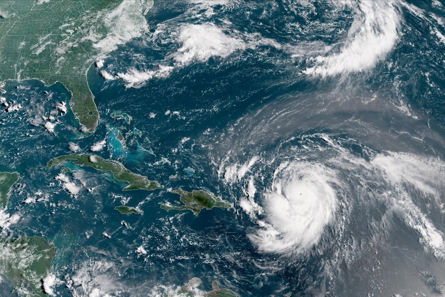 Hurricane Erin, which is the first hurricane of the 2025 Atlantic season and has developed into a dangerous Category 4 hurricane, moves westward near Puerto Rico in a composite satellite image August 16, 2025.  CIRA/NOAA/Handout via REUTERS  
THIS IMAGE HAS BEEN SUPPLIED BY A THIRD PARTY