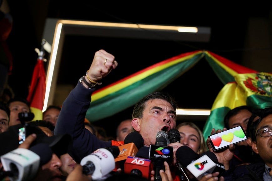 Bolivian presidential candidate centrist Senator Rodrigo Paz of the Christian Democratic Party (PDC) reacts while he speaks to members of the media, as early official results show that he is leading Sunday's presidential race, in La Paz, Bolivia August 17, 2025. REUTERS/Pilar Olivares
