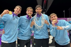 Los protagonistas de la medalla dorada. Foto: Fabián Gallego