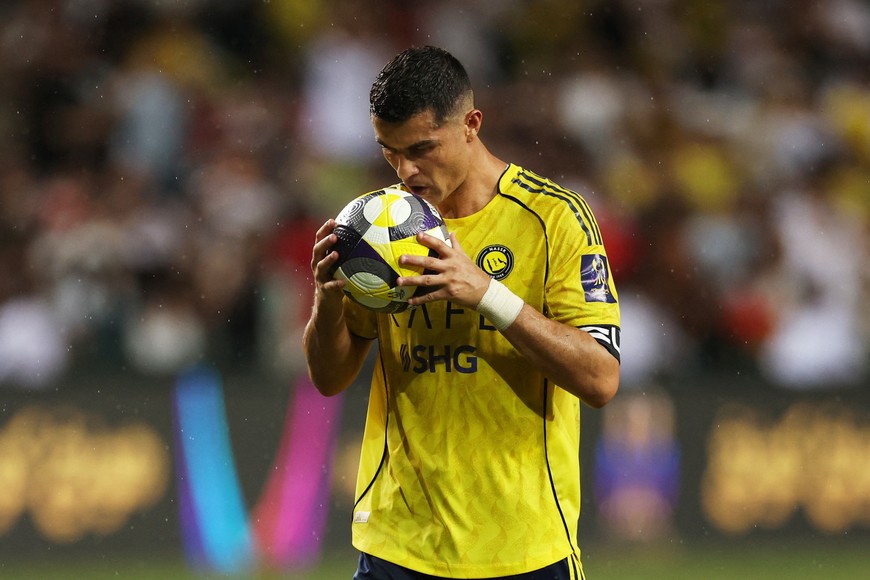 Soccer Football - Saudi Super Cup - Final - Al Nassr v Al Ahli - Hong Kong Stadium, Hong Kong, China - August 23, 2025 
Al Nassr's Cristiano Ronaldo before his penalty kick during the penalty shootout REUTERS/Tyrone Siu