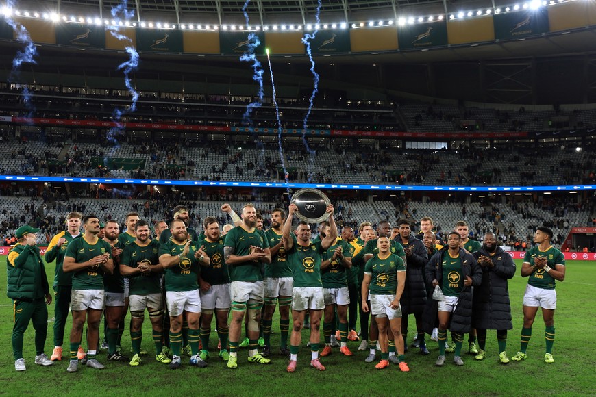 Rugby Union - Rugby Championship - South Africa v Australia - DHL Stadium, Cape Town, South Africa - August 23, 2025 
South Africa's Jesse Kriel lifts a trophy and celebrates with teammates after the match REUTERS/Esa Alexander