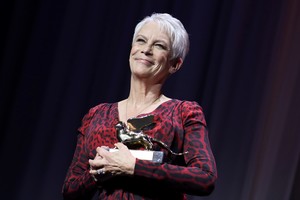 The 78th Venice Film Festival - Award Ceremony - Venice, Italy, September 8, 2021 - Actor Jamie Lee Curtis poses with a Golden Lion award for lifetime achievement. REUTERS/Yara Nardi