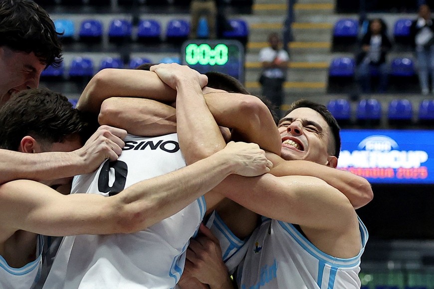 Basketball - FIBA AmeriCup 2025 - Group C - Argentina v Colombia - Polideportivo Alexis Arguello, Managua, Nicaragua - August 25, 2025
Argentina's Nicolas Brussino celebrates with teammates after the match REUTERS/Luisa Gonzalez