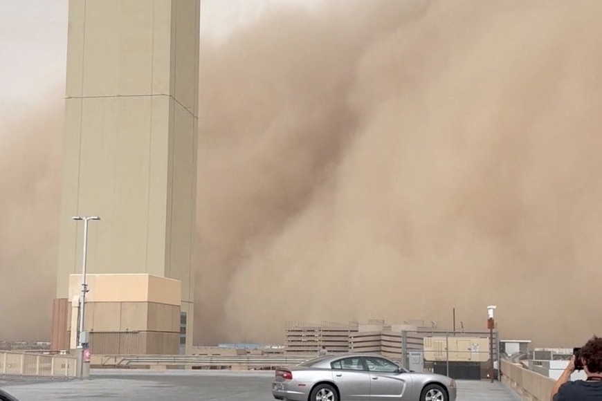 A dust storm blankets the sky over Phoenix Sky Harbor International Airport, in Phoenix, Arizona, U.S., August 25, 2025, in this screengrab obtained from a social media video. Charlie Budd/via REUTERS  THIS IMAGE HAS BEEN SUPPLIED BY A THIRD PARTY. MANDATORY CREDIT. NO RESALES. NO ARCHIVES.

VERIFICATION
- Reuters was able to confirm the location of the video from buildings, tower and airport terminal layout that matched file and satellite imagery. 
- Date of the video is verified by original file metadata.