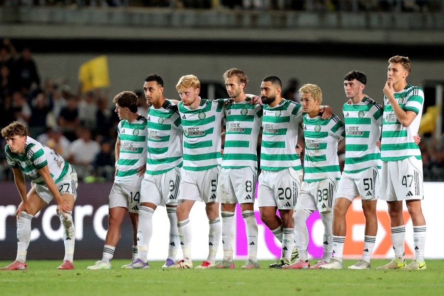 Soccer Football - UEFA Champions League - Play Off - Second Leg - Kairat v Celtic - Ortalyk Stadion, Almaty, Kazakhstan - August 26, 2025
Celtic players line up during the penalty shootout REUTERS/Pavel Mikheyev     TPX IMAGES OF THE DAY