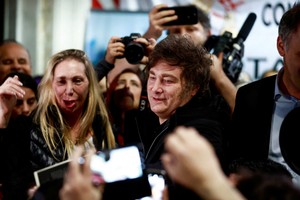 FILE PHOTO: Argentina's President Javier Milei and Argentina's General Secretary of the Presidency, Karina Milei, attend a campaign rally, ahead of the May 18 Buenos Aires' city legislative elections, in Buenos Aires, Argentina April 30, 2025. REUTERS/Matias Baglietto/File Photo