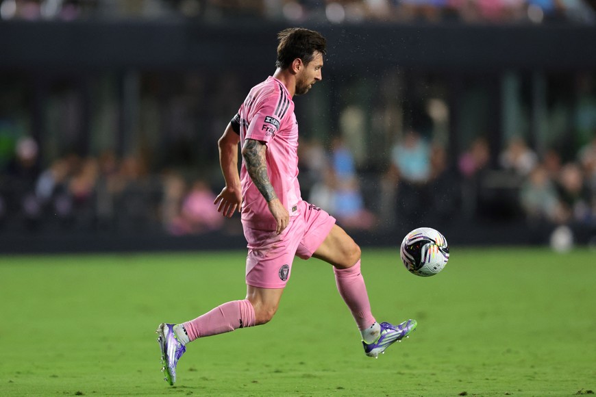 Aug 27, 2025; Fort Lauderdale, Florida, USA; Inter Miami CF forward Lionel Messi (10) dribbles the ball against Orlando City during the first half at Chase Stadium. Mandatory Credit: Sam Navarro-Imagn Images