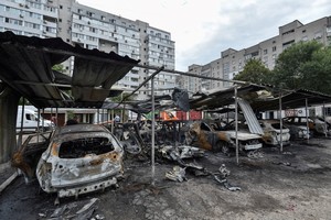 A view shows burned cars at the site of the Russian drone strike, amid Russia's attack on Ukraine, in Dnipro, Ukraine July 26, 2025. REUTERS/Mykola Synelnykov     TPX IMAGES OF THE DAY
