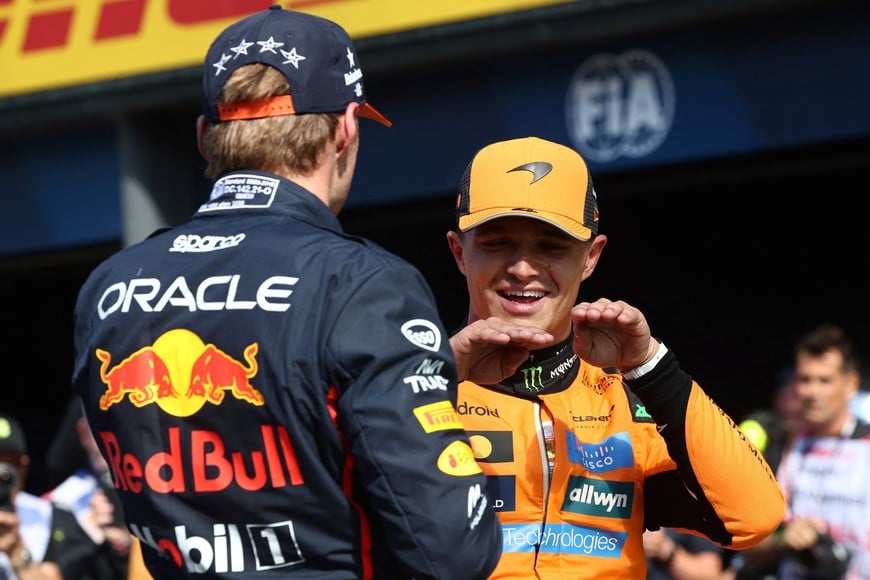 Formula One F1 - Dutch Grand Prix - Circuit Zandvoort, Zandvoort, Netherlands - August 30, 2025
Second placed McLaren's Lando Norris and third placed Red Bull's Max Verstappen react after qualifying REUTERS/Jakub Porzycki