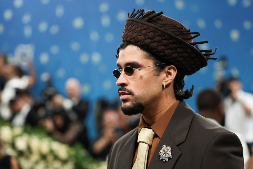 Bad Bunny poses during the Met Gala, an annual fundraising gala held for the benefit of the Metropolitan Museum of Art's Costume Institute with this year's theme 'Superfine: Tailoring Black Style,' in New York City, New York, U.S., May 5, 2025. REUTERS/Mario Anzuoni