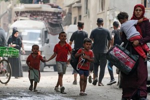 El alto comisionado de la ONU para los Derechos Humanos llamó a la comunidad internacional a impedir "un genocidio" en este territorio palestino.  Bashar Taleb/AFP