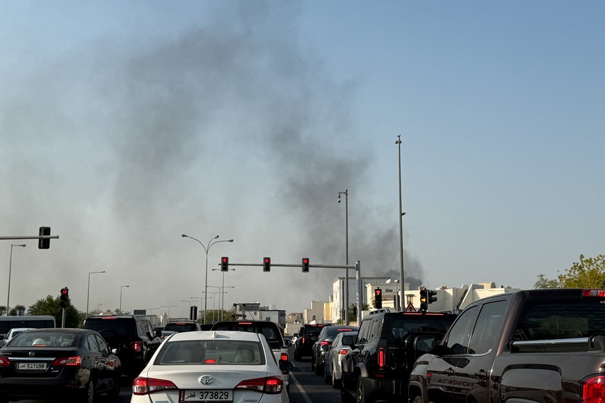 Smoke rises after several blasts were heard in Doha, Qatar, September 9, 2025. REUTERS/Ibraheem Abu Mustafa