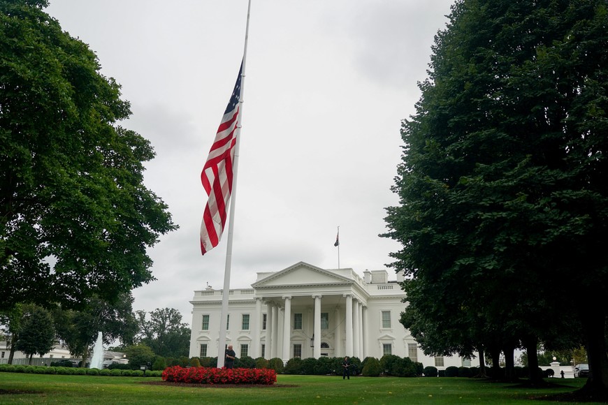 A U.S. flag files at half mast, after right-wing activist Charlie Kirk, an ally of U.S. President Donald Trump, was fatally shot at an event at Utah Valley University in Orem, Utah, in Washington, D.C., U.S. September 10, 2025.  REUTERS/Nathan Howard