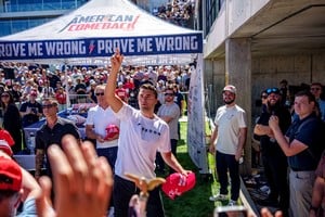 U.S. right-wing activist and commentator Charlie Kirk throws hats to the crowd shortly before he was shot at a Utah Valley University speaking event in Orem, Utah, U.S. September 10, 2025. Trent Nelson/The Salt Lake Tribune via REUTERS.    
NO RESALES. NO ARCHIVES. THIS IMAGE HAS BEEN SUPPLIED BY A THIRD PARTY