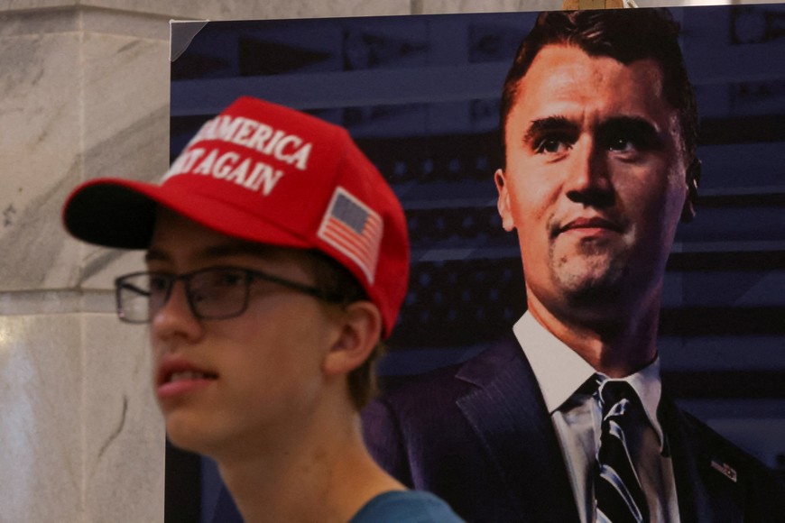 A poster of U.S. right-wing activist, commentator, Charlie Kirk, an ally of U.S. President Donald Trump, who was fatally shot during an event at Utah Valley University, as people attend a vigil for him at the Utah State Capitol, in Salt Lake City, Utah, U.S. September 10, 2025.  REUTERS/Jim Urquhart
     TPX IMAGES OF THE DAY