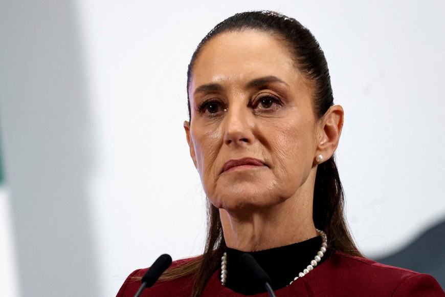 FILE PHOTO: Mexico's President Claudia Sheinbaum listens to a question during her daily news conference at National Palace, in Mexico City, Mexico, June 25, 2025. REUTERS/Raquel Cunha/File Photo