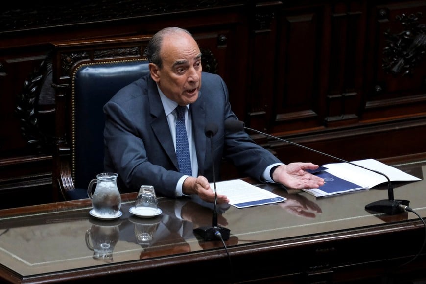 Argentina's Cabinet Chief, Guillermo Francos, gestures as he addresses lawmakers at the National Congress with his monthly performance report amid government corruption allegations, in Buenos Aires, Argentina August 27, 2025. REUTERS/Alessia Maccioni