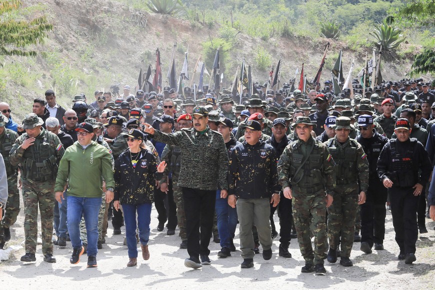 Venezuela's President Nicolas Maduro, his wife Cilia Flores, Venezuela's Interior Minister Diosdado Cabello, and Venezuela's Defense Minister Vladimir Padrino Lopez, attend the closing ceremony of the second Revolutionary Special Operations Course (COER), held at the Command Action Group of the Bolivarian National Guard at Macarao parish, in Caracas, Venezuela, August 28, 2025. Miraflores Palace/Handout via REUTERS    THIS IMAGE HAS BEEN SUPPLIED BY A THIRD PARTY