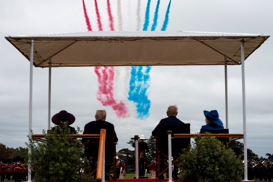 The Red Arrows, the Royal Air Force display team, roared overhead as U.S. President Donald Trump, Britain's King Charles III, Queen Camilla, and First Lady Melania Trump watch the Beating Retreat Ceremony at Windsor Castle, in Windsor, England, Wednesday, Sept. 17, 2025. Doug Mills/The New York Times/Pool via REUTERS