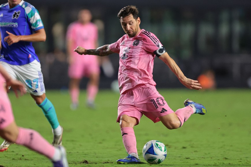 Sep 16, 2025; Fort Lauderdale, Florida, USA; Inter Miami CF forward Lionel Messi (10) shoots the ball against Seattle Sounders during the second half at Chase Stadium. Mandatory Credit: Sam Navarro-Imagn Images