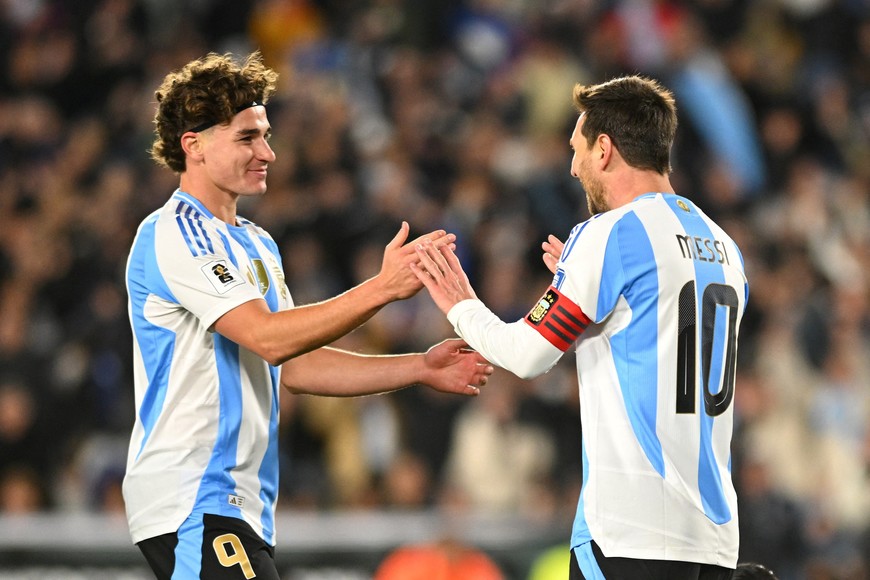 Soccer Football - World Cup - CONMEBOL Qualifiers - Argentina v Venezuela - Estadio Monumental, Buenos Aires, Argentina - September 4, 2025
Argentina's Lionel Messi celebrates scoring their first goal with Julian Alvarez REUTERS/Rodrigo Valle
