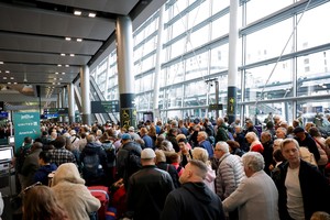 People queue inside Terminal 2 at Dublin Airport, following its reopening after it was evacuated as a safety precaution, in Dublin, Ireland, September 20, 2025. REUTERS/Clodagh Kilcoyne