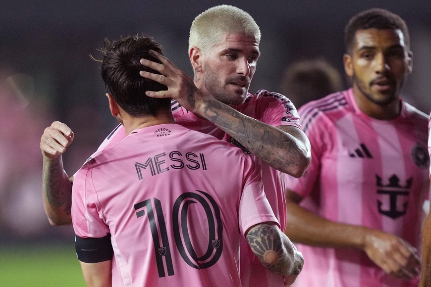 Sep 20, 2025; Fort Lauderdale, Florida, USA;  Inter Miami midfielder Rodrigo DePaul (7) celebrates a goal by forward Lionel Messi (10) against D.C. United in the second half at Chase Stadium. Mandatory Credit: Jim Rassol-Imagn Images