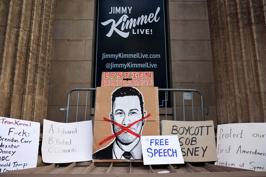 Signs are arranged during a protest at the El Capitan Entertainment Centre, where "Jimmy Kimmel Live!" was recorded for broadcast, following his suspension for remarks he made regarding Charlie Kirk’s assassination, on Hollywood Boulevard in Los Angeles, California, U.S. September 18, 2025.  REUTERS/David Swanson