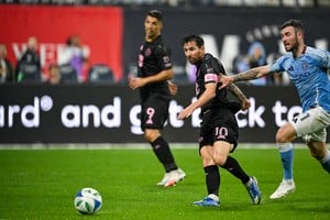 Sep 24, 2025; New York, NY, New York, NY, USA; Inter Miami forward Lionel Messi (10) scores his second goal of the match during the second half chased by New York City FC midfielder Aiden O'Neill (21) at Citi Field. Mandatory Credit: Mark Smith-Imagn Images