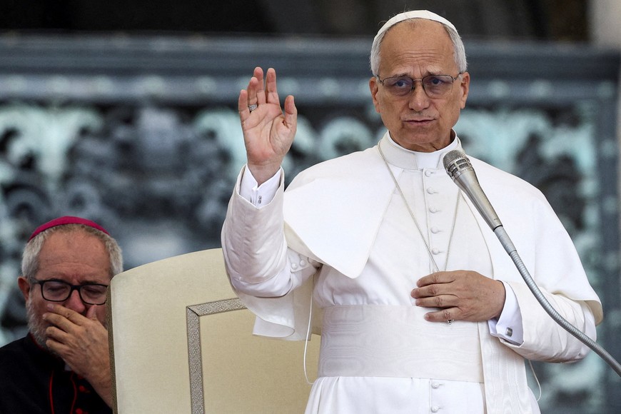 FILE PHOTO: Pope Leo XIV blesses the crowd during a weekly general audience in St. Peter's Square at the Vatican, September 24, 2025. REUTERS/Guglielmo Mangiapane/File Photo