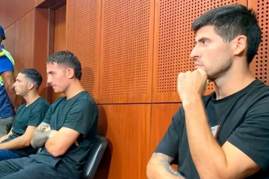 Los jugadores Osorio, Cufré y Florentín en una de las primeras instancias penales