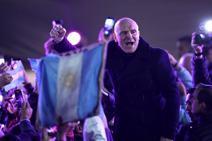 Lawmaker Jose Luis Espert gestures as he attends the La Libertad Avanza party closing campaign rally held by Argentina's President Javier Milei days before the legislative elections in the province of Buenos Aires, in Moreno on the outskirts of Buenos Aires, Argentina, September 3, 2025. REUTERS/Agustin Marcarian