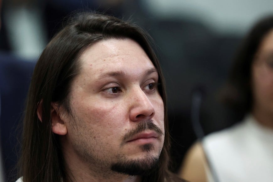 Nicolas Carrizo who is accused of attempting to assassinate Argentina's former President Cristina Fernandez de Kirchner when she was vice-president of the country, sits in court at the Comodoro Py federal courthouse in Buenos Aires, Argentina, October 8, 2025 REUTERS/Agustin Marcarian