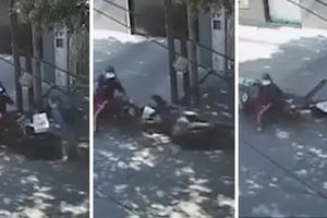 La arrastró varios metros sobre el asfalto.