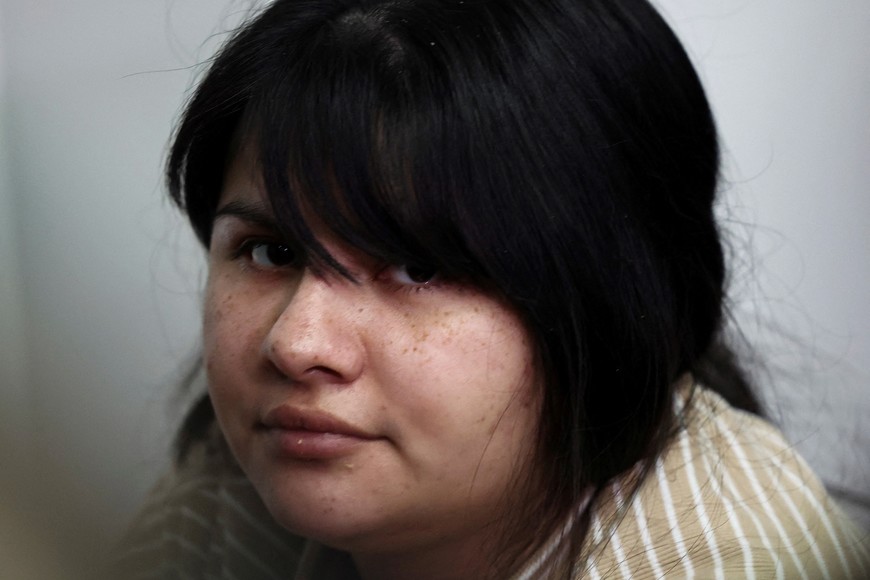 Brenda Uliarte who is accused of attempting to assassinate Argentina's former President Cristina Fernandez de Kirchner when she was vice-president of the country, sits in court at the Comodoro Py federal courthouse in Buenos Aires, Argentina, October 8, 2025 REUTERS/Agustin Marcarian