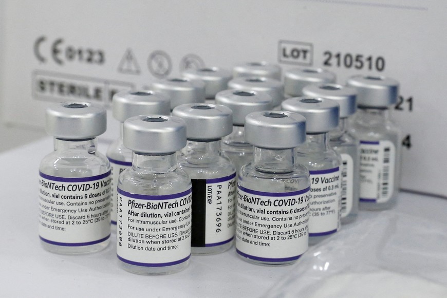 FILE PHOTO: Vials containing the Pfizer/BioNtech vaccine against the coronavirus disease (COVID-19) are displayed before being used at a mobile vaccine clinic, in Valparaiso, Chile, January 3, 2022. REUTERS/Rodrigo Garrido/File Photo