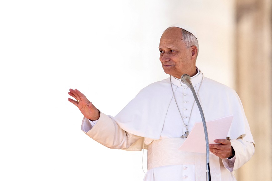 Pope Leo XIV gestures, on the day he greets pilgrims from the Dioceses of Tuscany, in Saint Peter square at the Vatican, October 11, 2025. REUTERS/Matteo Minnella