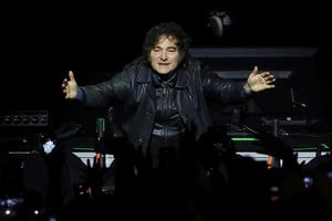 Argentine President Javier Milei gestures during the presentation of his book "Construction of the Miracle", at the Movistar Arena, in Buenos Aires, Argentina, October 6, 2025. REUTERS/Agustin Marcarian