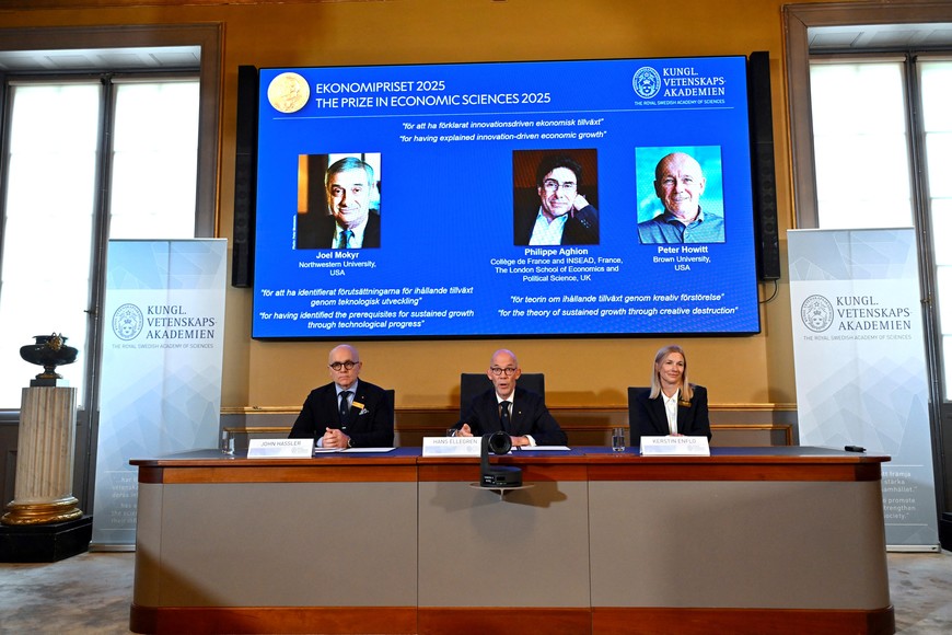 The Nobel Prize in Economics 2025 is awarded to Joel Mokyr, Northwestern University, Evanston, Illinois, U.S., Philippe Aghion, College de France and INSEAD, Paris, France, and The London School of Economics and Political Science, UK, and Peter Howitt, Brown University, Providence, Rhode Island, U.S., The Sveriges Riksbank Prize in Economic Sciences in Memory of Alfred Nobel, the Nobel Prize in Economic Sciences 2025, is presented during a press conference at the Royal Swedish Academy of Sciences in Stockholm, Sweden on Monday 13 October 2025. Professor John Hassler, Chairman of the Committee for the Prize in Economic Sciences in Memory of Alfred Nobel, Hans Ellegren, Permanent Secretary of the Academy of Sciences and Professor Kerstin Enflo, Member of the Committee for the Prize in Economic Sciences in Memory of Alfred Nobel. Anders Wiklund/TT News Agency/via REUTERS      ATTENTION EDITORS - THIS IMAGE WAS PROVIDED BY A THIRD PARTY. SWEDEN OUT. NO COMMERCIAL OR EDITORIAL SALES IN SWED