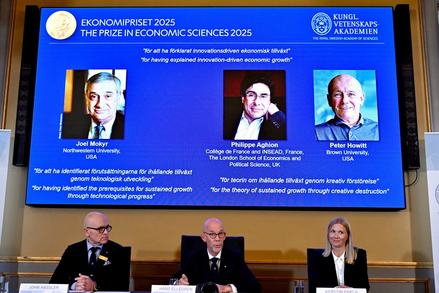 The Nobel Prize in Economics 2025 is awarded to Joel Mokyr, Northwestern University, Evanston, Illinois, U.S., Philippe Aghion, College de France and INSEAD, Paris, France, and The London School of Economics and Political Science, UK, and Peter Howitt, Brown University, Providence, Rhode Island, U.S., The Sveriges Riksbank Prize in Economic Sciences in Memory of Alfred Nobel, the Nobel Prize in Economic Sciences 2025, is presented during a press conference at the Royal Swedish Academy of Sciences in Stockholm, Sweden on Monday 13 October 2025. Professor John Hassler, Chairman of the Committee for the Prize in Economic Sciences in Memory of Alfred Nobel, Hans Ellegren, Permanent Secretary of the Academy of Sciences and Professor Kerstin Enflo, Member of the Committee for the Prize in Economic Sciences in Memory of Alfred Nobel. Anders Wiklund/TT News Agency/via REUTERS      ATTENTION EDITORS - THIS IMAGE WAS PROVIDED BY A THIRD PARTY. SWEDEN OUT. NO COMMERCIAL OR EDITORIAL SALES IN SWED