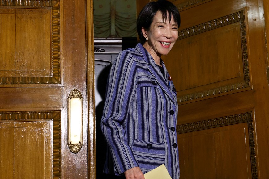 Leader of Japan's ruling Liberal Democratic Party (LDP) Sanae Takaichi leaves from a room after meeting Japan Innovation Party's co-leader Fumitake Fujita (not in the photo) at Japan's National Diet Building in Tokyo, Japan, October 17, 2025. REUTERS/Kim Kyung-Hoon