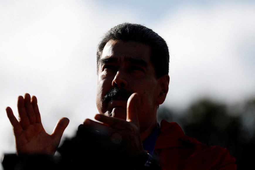 FILE PHOTO: Venezuela's President Nicolas Maduro participates in a demonstration to mark Indigenous Resistance Day, in Caracas, Venezuela, October 12, 2025. REUTERS/Leonardo Fernandez Viloria/File Photo