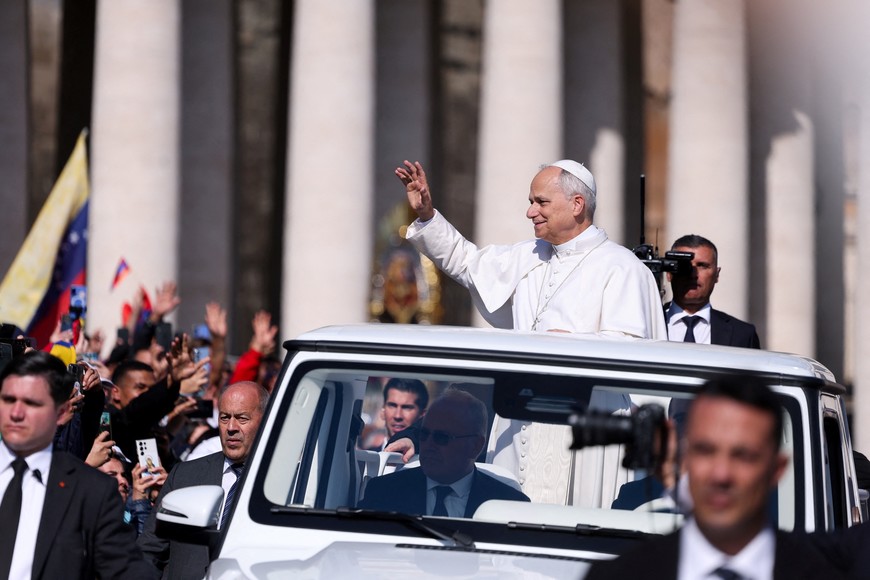 Pope Leo XIV waves to the faithful from the Popemobile (Papamobile) on the day of the canonisation of seven new saints, including former Satanist-turned-Catholic Bartolo Longo, in St. Peter's Square at the Vatican, October 19, 2025. REUTERS/Claudia Greco