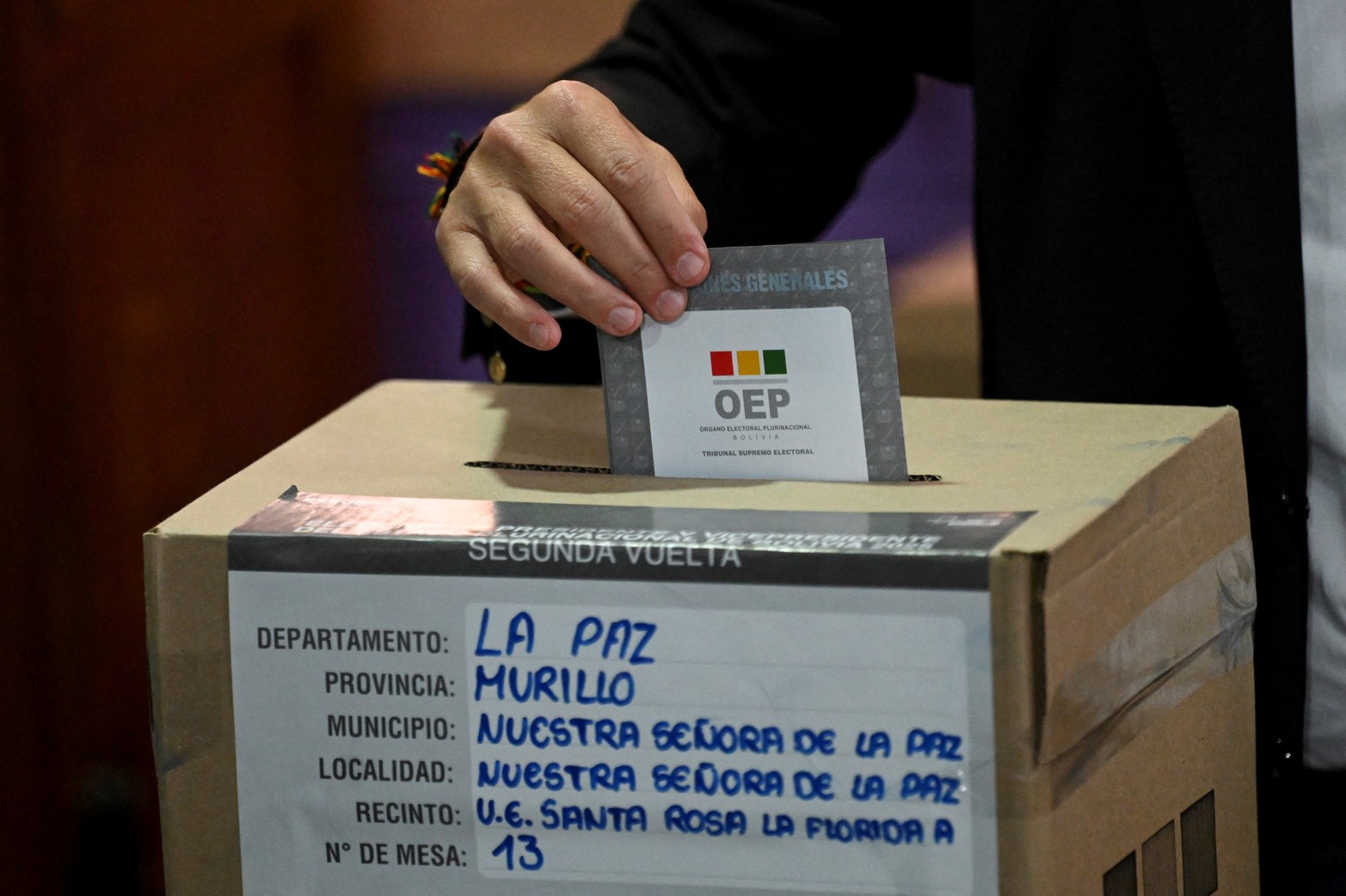 Conservative Bolivian former President Jorge "Tuto" Quiroga, presidential candidate for the Alianza Libre Coalition, casts his vote during the presidential runoff election in La Paz, Bolivia, October 19, 2025. REUTERS/Claudia Morales