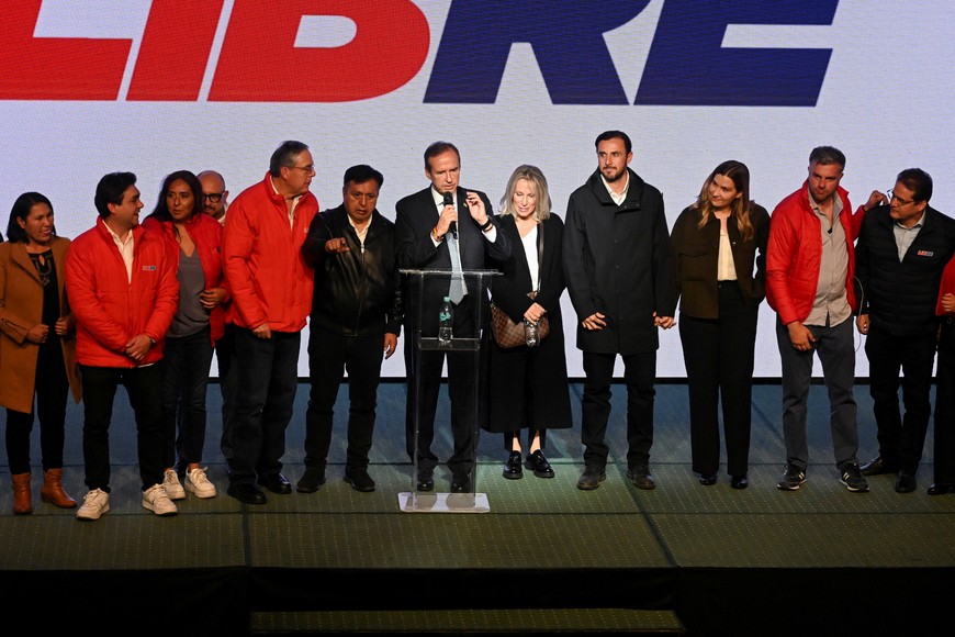 Conservative Bolivian former President Jorge "Tuto" Quiroga, presidential candidate for the Alianza Libre Coalition, speaks onstage following the preliminary results in the presidential runoff election, at his election night headquarters, at Hotel Europa, in La Paz, Bolivia, October 19, 2025. REUTERS/Claudia Morales