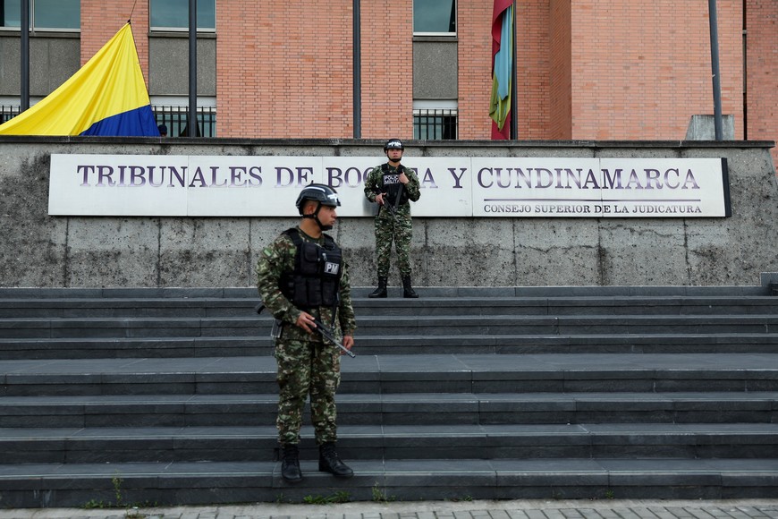 Military police stand guard outside the Administrative Tribunal of Cundinamarca, as the country awaits a ruling on an appeal in a criminal case against former Colombian President Alvaro Uribe, in Bogota, Colombia October 21, 2025. REUTERS/Luisa Gonzalez