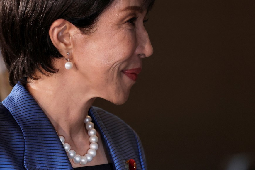 Japan's new Prime Minister Sanae Takaichi reacts as she arrives at the prime minister's official residence in Tokyo, Japan October 21, 2025. REUTERS/Kim Kyung-Hoon