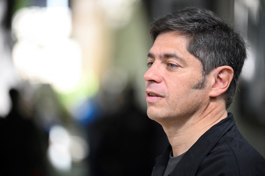 Buenos Aires Province Governor Axel Kicillof looks on at a polling station during the key midterm election, which is seen as crucial for the administration after U.S. President Donald Trump warned that future support for Argentina would depend on Argentine President Javier Milei's party performing well in the vote, in La Plata, Buenos Aires, Argentina, October 26, 2025. REUTERS/Martin Cossarini